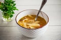 hot vegetable soup with large pasta in a bowl