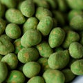 Hot Wasabi Peanuts. Wasabi coated peanuts close-up. Green spicy Japanese snack