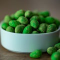 Hot Wasabi Peanuts. Wasabi coated peanuts close-up. Green spicy Japanese snack