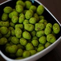 Hot Wasabi Peanuts. Wasabi coated peanuts close-up. Green spicy Japanese snack