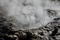 Hot water erupting from a geyser frozen in time. Geysers Del Tatio, Antofagasta, Chile.