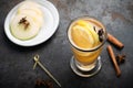 Hot winter Christmas drink in a glass mug: herbal tea with cinnamon Royalty Free Stock Photo