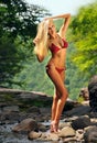 Hot young woman with perfect slim body in bikini Royalty Free Stock Photo