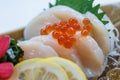 Hotate Sashimi : Raw Scallop Served with Ikura Salmon Roe with Sliced Radish and Lemon