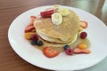 Hotcakes with Banana Berries and Honey Royalty Free Stock Photo