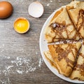 Hotcakes with chocolate on plate