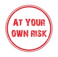 at your own risk stamp on white Royalty Free Stock Photo