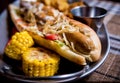 Hotdog and French fries on a dish. Fast food meal. Restaurant. Royalty Free Stock Photo