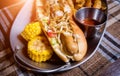 Hotdog and French fries on a dish. Fast food meal. Restaurant. Royalty Free Stock Photo