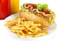 Hotdog with french fries on a plate on white Royalty Free Stock Photo