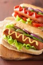 Hotdog with ketchup mustard and vegetables Royalty Free Stock Photo