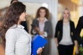 Hotel Administrator Welcome Business People In Lobby, Mix Race Businesspeople Group Guests Arrive Royalty Free Stock Photo