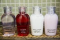 Hotel amenities kit spa, soap and shampoo in vintage bathroom Royalty Free Stock Photo