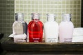 Hotel amenities kit spa, soap and shampoo in vintage bathroom Royalty Free Stock Photo