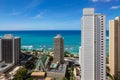 The hotel architecture with the iconic Waikiki beach in the back Royalty Free Stock Photo