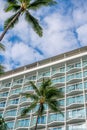 Hotel balconies with palm trees Royalty Free Stock Photo