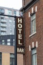 Hotel bar sign on building in downtown Montreal, Canada Royalty Free Stock Photo