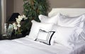 Hotel Bed And White Linen Royalty Free Stock Photo