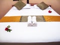 Hotel bed with white linen Royalty Free Stock Photo