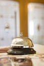 Hotel bell on a wood stand Royalty Free Stock Photo