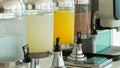 Hotel beverages dispensers. Drinking water, lemonade, orange juice Royalty Free Stock Photo
