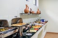 Hotel breakfast board in a family hotel. Buffet with different dishes.