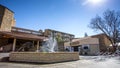 Hotel and casino with water feature at entrance.