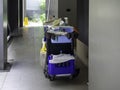 Hotel cleaning tool cart with cleaners. Royalty Free Stock Photo