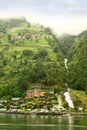 Hotel and coastal village under mountain Royalty Free Stock Photo