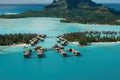 A hotel complex with bungalows on the Bora Bora islands, generative AI.