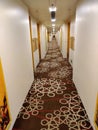 Hotel corridor with yellow light and a nice carpet