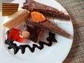 Hotel dessert plate with cakes, tarts and jelly.