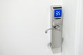 Hotel electronic lock on white door Royalty Free Stock Photo