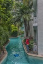 Hotel employee cleaning the pool net