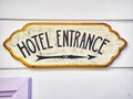 Hotel entrance arrow signboard.