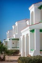 Hotel facade in Egypt With palm trees Royalty Free Stock Photo