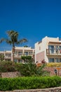 Hotel facade in Egypt With palm trees Royalty Free Stock Photo