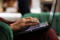 Hotel guest works on laptop at hotel Royalty Free Stock Photo