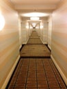 Hotel hallway long perspective corridor Royalty Free Stock Photo