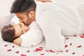Hotel, happy and love couple on a holiday for a romantic anniversary trip with happiness. Kiss, hug and passion of young Royalty Free Stock Photo