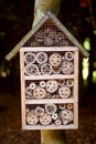 A hotel for insects in a park Royalty Free Stock Photo