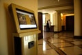 Hotel interior, digital signage, kiosk touch. Generative AI