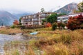 Hotel by Kawaguchiko lake with colorful autumn leaf in morning Royalty Free Stock Photo
