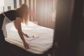 Hotel maid doing room service. Royalty Free Stock Photo