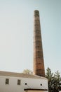 Hotel Millwright in the Amana Colonies of Iowa, with a scenic woolen mill with a tall smoke stack Royalty Free Stock Photo