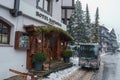 Hotel National entrance in Zermatt, snowy day, alpine architecture. Royalty Free Stock Photo