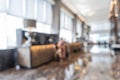 Hotel or office building lobby blur background interior view toward reception hall, modern luxury white room space with blurry Royalty Free Stock Photo