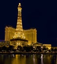 Hotel Paris and replica of Eiffel Tower at night in Las Vegas