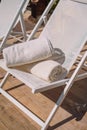 Hotel pool chair with folded towels