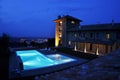 Hotel pool at night Royalty Free Stock Photo